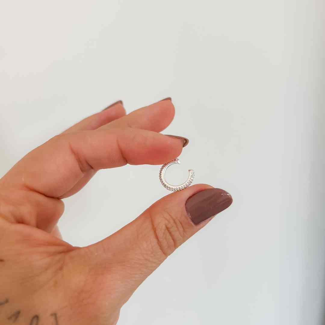 Piercing fake conch cravejado