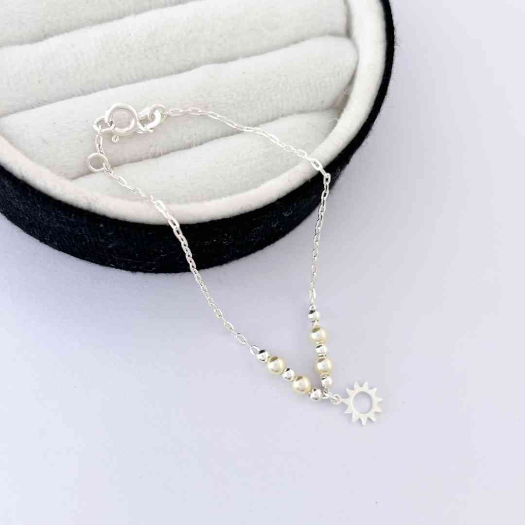 Pulseira Pérolas e Sol