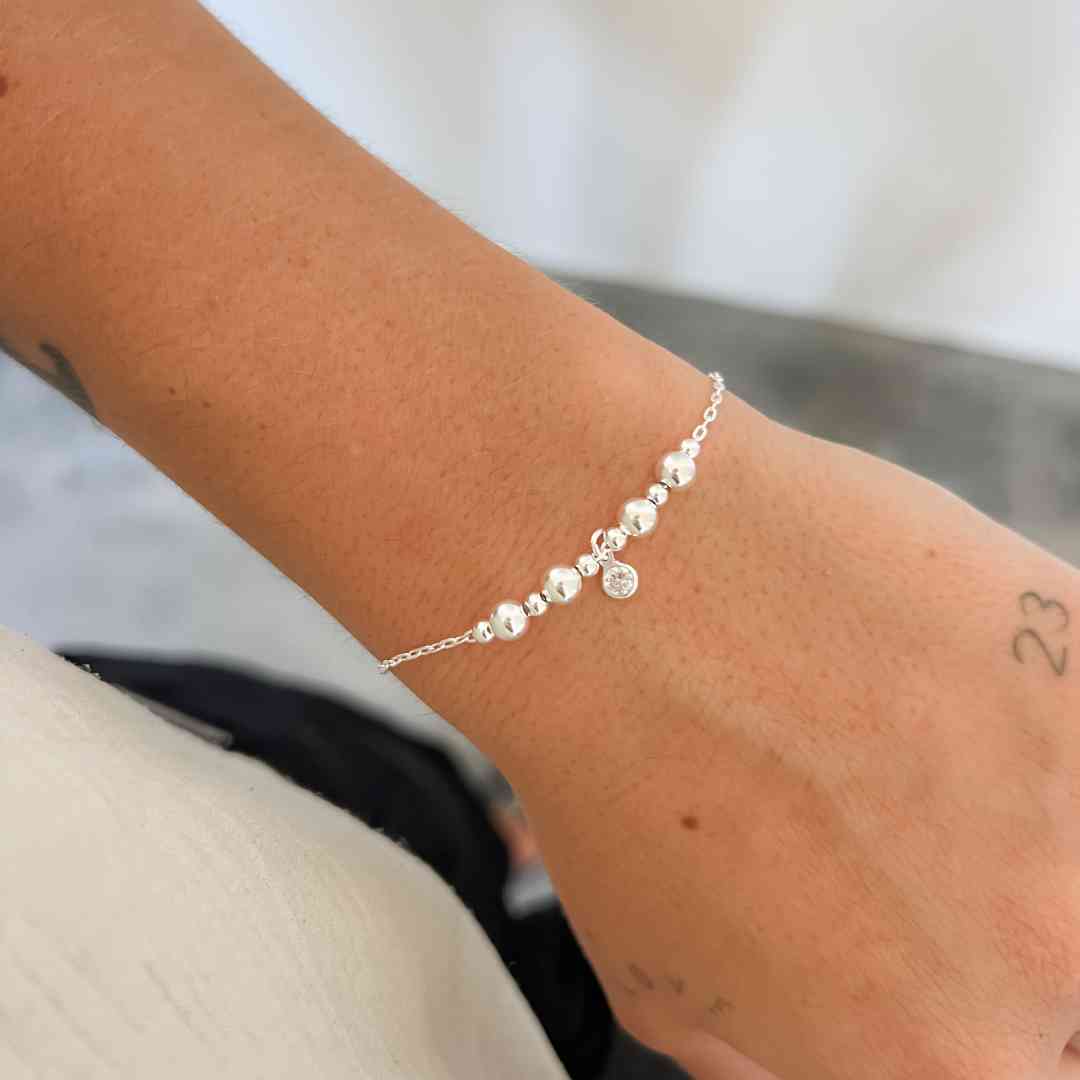 Pulseira Esferas e ponto de luz